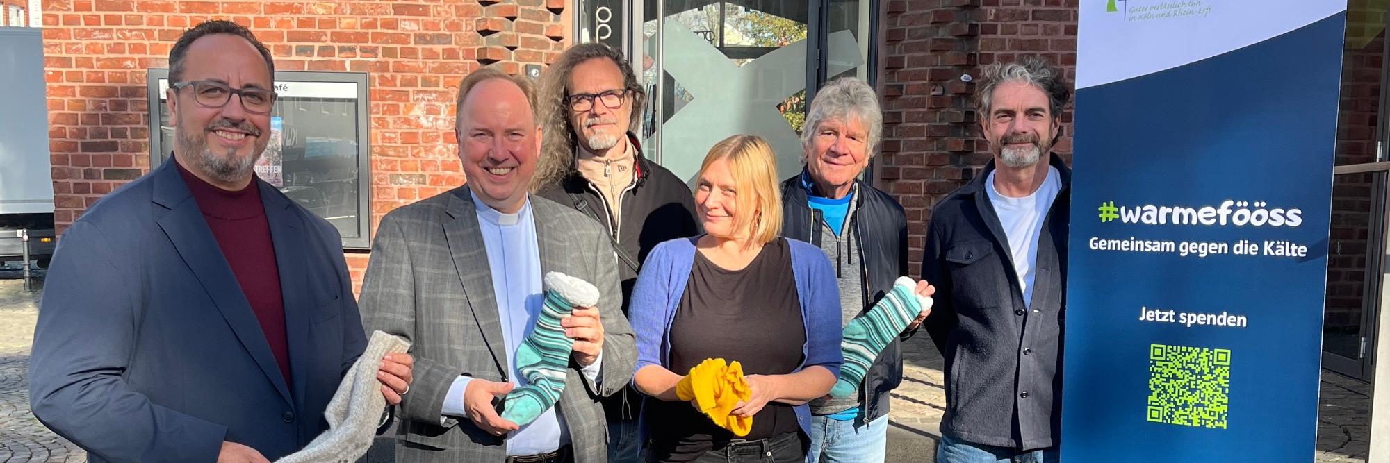 2026-10-15-KJA Köln-Gemeinsam gegen die Kälte Winterhilfe #warmefööss startet mit prominenter Unterstützung in den Winter Bild 1